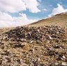 The prominently elevated forward flank of a large terraced funerary structure.