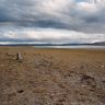 The site’s upright stones. The salt lake on the right side of the image is Gomang Tso (<i>sgo mang mtsho</i>).