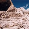 Revetment fragments lining the ledge in front of the east chamber.