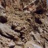 The site’s north ledge. Note the massive revetment lining the rim of the ledge.