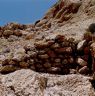 A close-up of a curtain-wall fragment at the low end of the site.