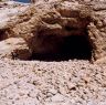 The large amounts of rubble in front of the cave.