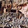 The adobe-block walls of the Lamaist occupation (Phase II) behind the stone walls of the archaic cultural horizon (Phase I), Galo Puk (<i>gwa lo phug</i>).