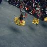 Laymen Dancers, "Dance of the Drummers from Dramitse" (dGra med rtse rnga 'cham), Paro Tshechu (tshes bcu), 1st day, in the dzong.