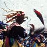 Layman Dancer with Garuda mask, "Dance of the Drummers from Dramitse" (dGra med rtse rnga 'cham), Paro Tshechu (tshes bcu), 1st day, in the dzong.