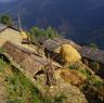 House roofs and straw stacks taken from the upper path in the village