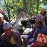 Guests 'pae lava' baskets of grain for the ritual beside them including Bolbahadur, Rudrabahadur and Debiprasad from Thak