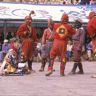 The hunter Gonpo Dorje, his servant Acho Pento with other atsara, dance of Milarepa (Sha ba sha khyi 'cham), Paro Tshechu (tshes bcu), dance arena, Paro Tshechu (tshes bcu), 2nd day