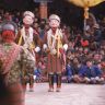 the two Princes and one princess (viewed from the back), Dance of the Noblemen and the ladies (Pho legs mo legs), Paro Tshechu (tshes bcu), dance arena, Paro Tshechu (tshes bcu), 3rd day