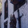 Dance of the Raksha (Raksha mang 'cham): Puppet of Yama Dharmaraja (gShin rje chos rgyal) along the wall, Paro Tshechu (tshe bcu), 4th day