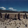 The pillars of Naklhé Doring (<i>nag lhas rdo ring</i>) Northeast from the east. Note the rock-strewn ground of the enclosure behind the pillars.