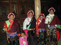 Nomad women and children waiting to see Abbot Dorji Tashi inside the monastery.