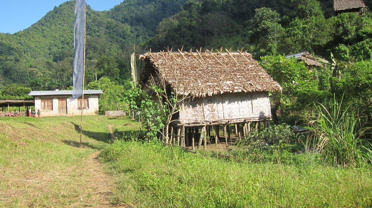 Traditional Bhutanese farmhouse in a rural village of Kagtong under ...