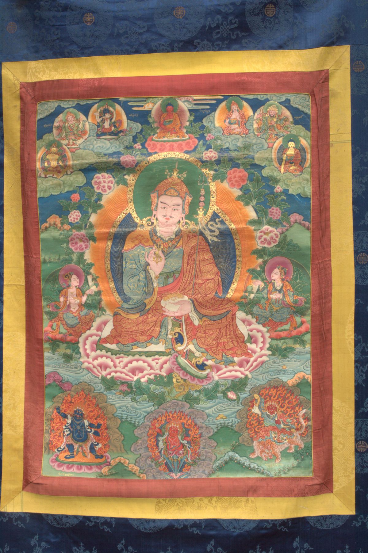 A bhutanese kuthang applique of Guru Rinpoche and the eight ...