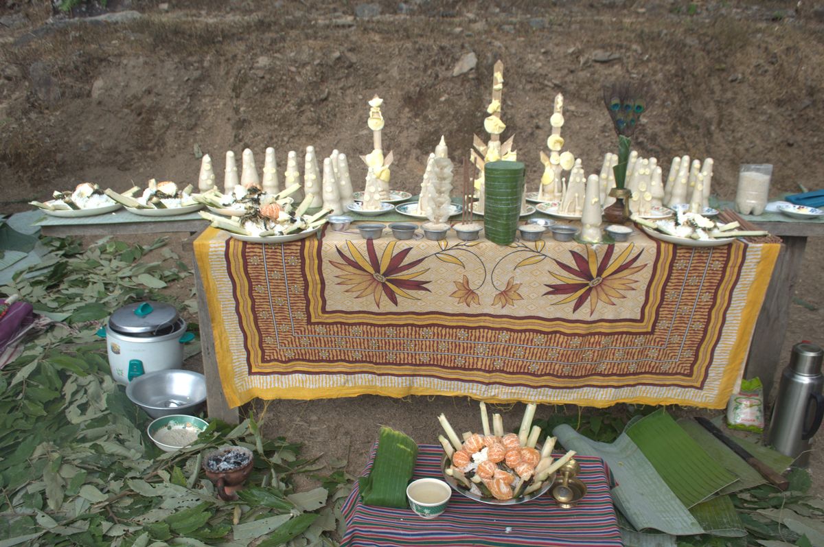 Tshog and sacrificial ritual cakes are seen on the altar during the ...