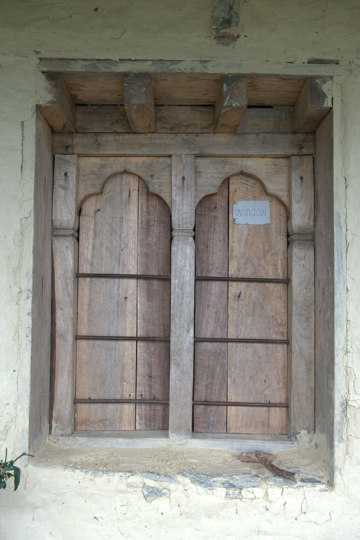 Window frame of a traditional Bhutanese house in a rural village ...