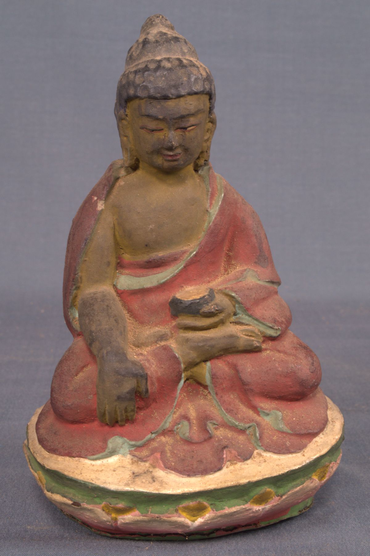 An old bhutanese clay statue probably depicting the Buddha. | Mandala ...