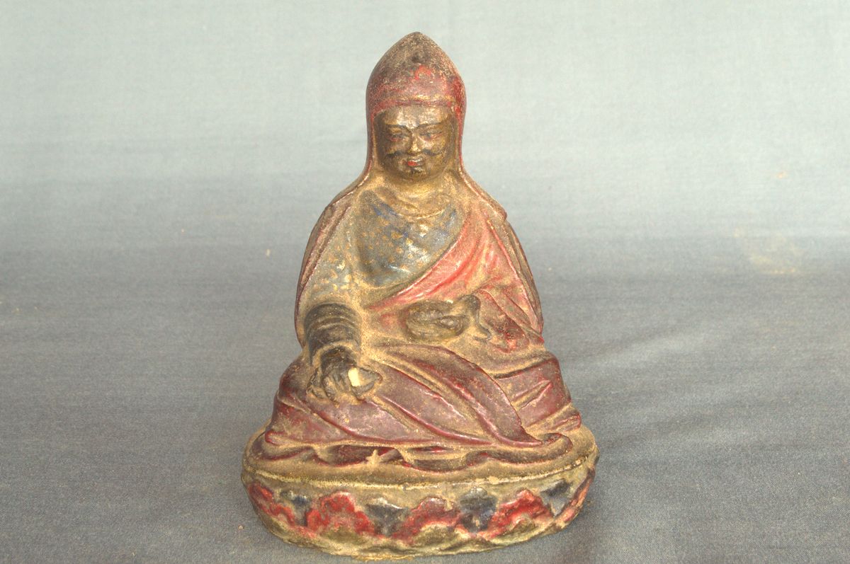 A bhutanese clay statue of a buddhist figure. | Mandala Collections ...